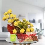 yellow carnations and dry fruit