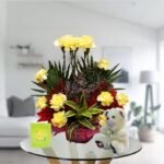yellow carnations bouquet arrangement and teddy