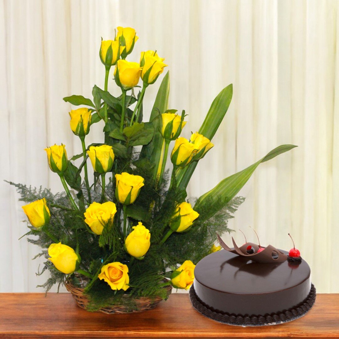 Yellow roses basket arrangement with a freshly baked chocolate cake from BetterGiftFlowers, perfect for gifting on joyful occasions.