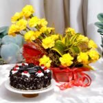 Yellow carnations basket with Black Forest cake from Better Gift Flowers.