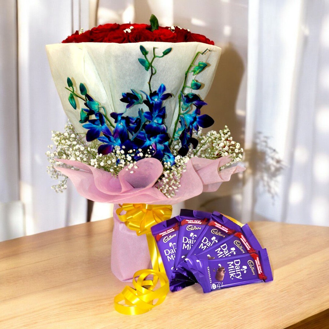 BetterGiftFlowers bouquet of red roses and blue orchids with Dairy Milk chocolates