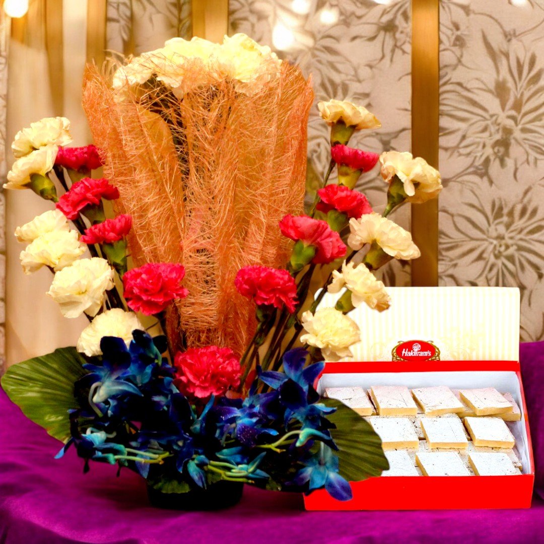 BetterGiftFlowers vibrant floral arrangement paired with Haldiram's Kaju Katli in Flowers N Kaju Katli combo