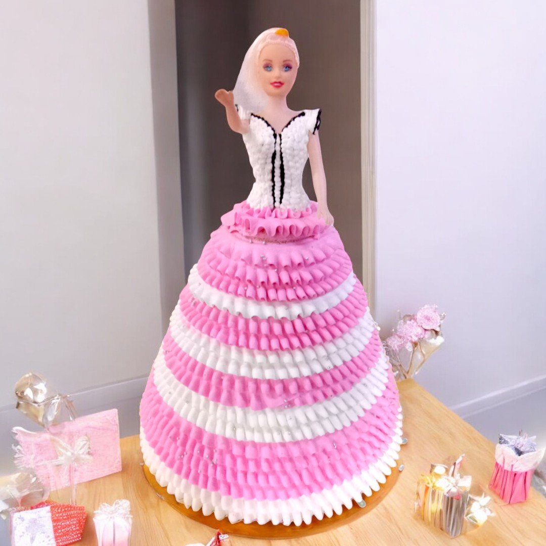 Pink Dress Doll Cake by BetterGiftFlowers with frilly design and elegant decoration for birthdays and special occasions.