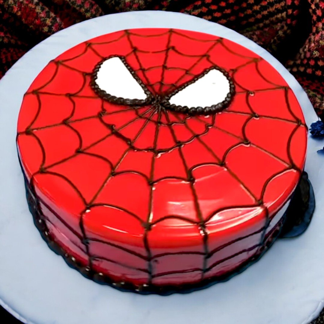 Spiderman-themed cake with web design by BetterGiftFlowers, perfect for kids' birthdays