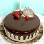 BetterGiftFlowers Chocolate Caramel Cake with smooth chocolate glaze and strawberry decoration