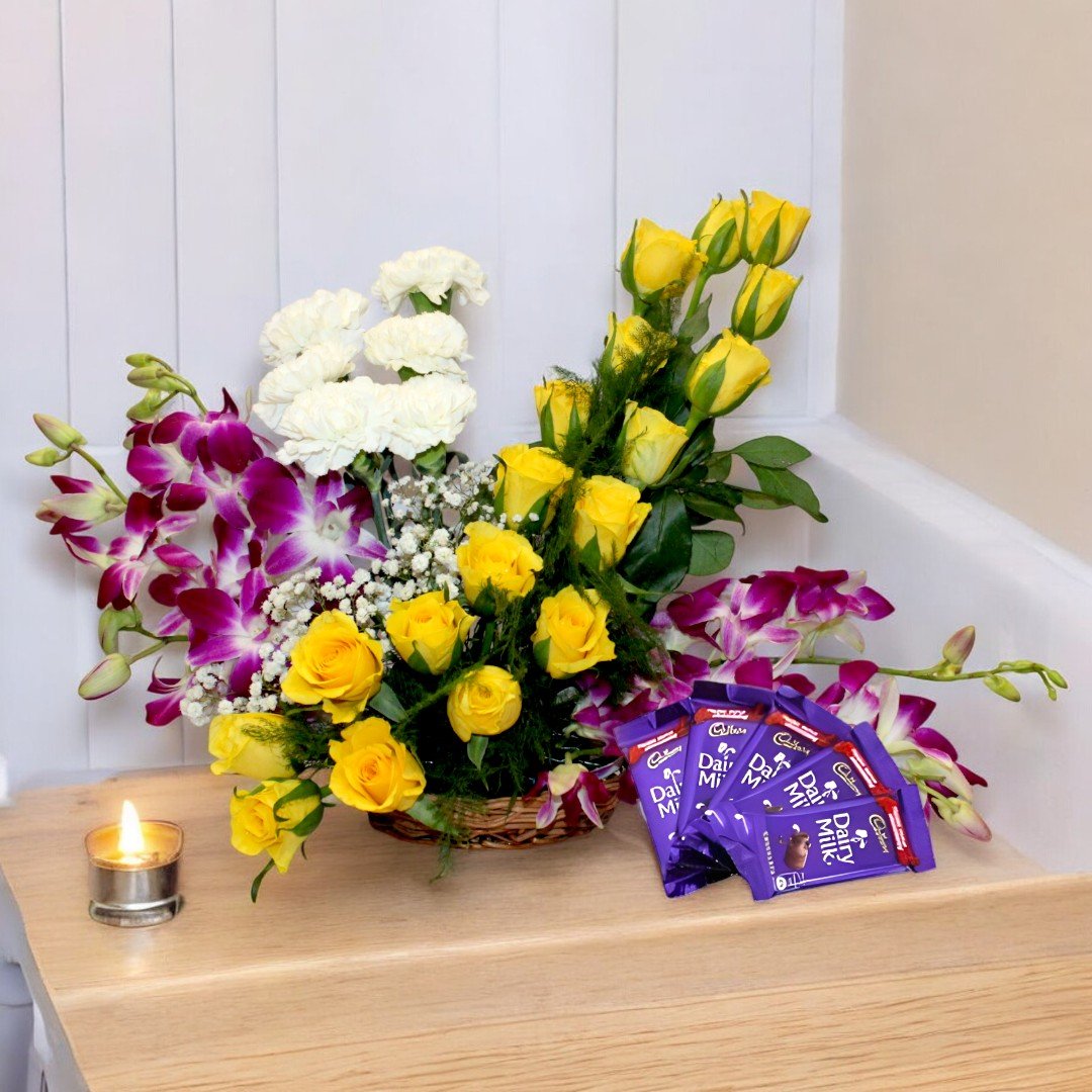 A Royal Treat by BetterGiftFlowers featuring yellow roses, white carnations, purple orchids, and Dairy Milk chocolates