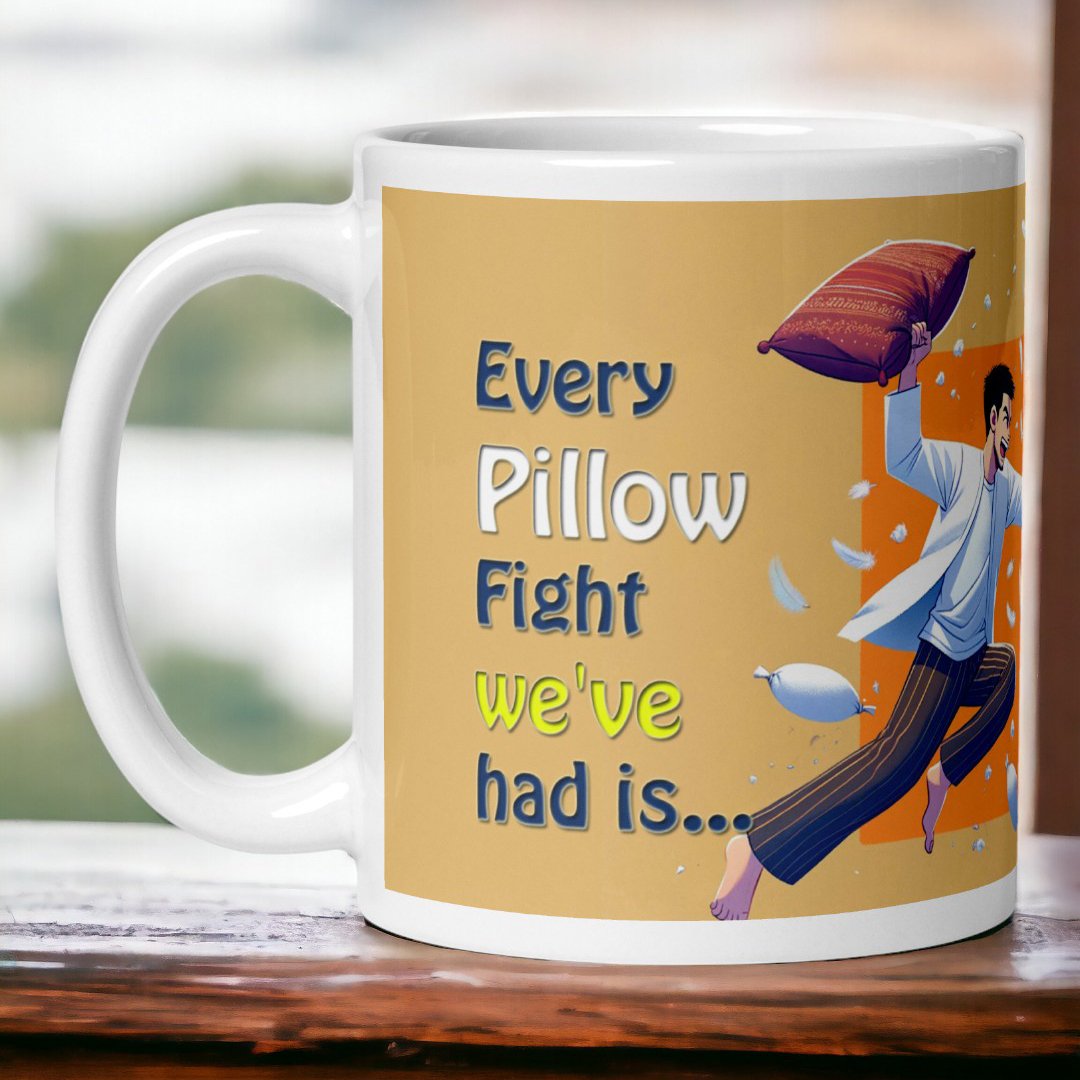 Close-up of BetterGiftFlowers "Pillow Fight" mug with the text "Every Pillow Fight we've had is..." and an illustration of a man ready for a pillow fight.